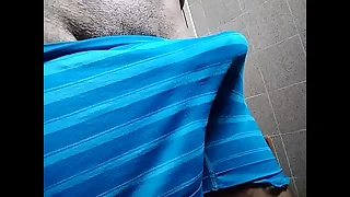 Flashing you about a huge louring boner under my cyan boxers